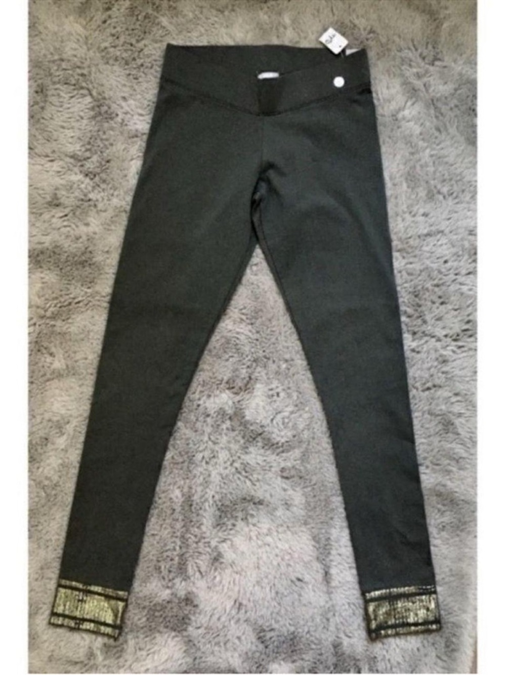Aerie dark grey leggings with silver metallic cracked foil design at ankles